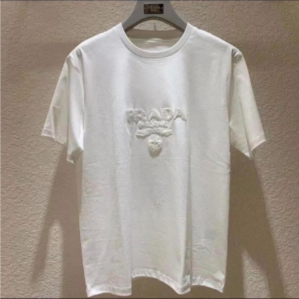 Prada Embossed Logo White Tee size L unisex